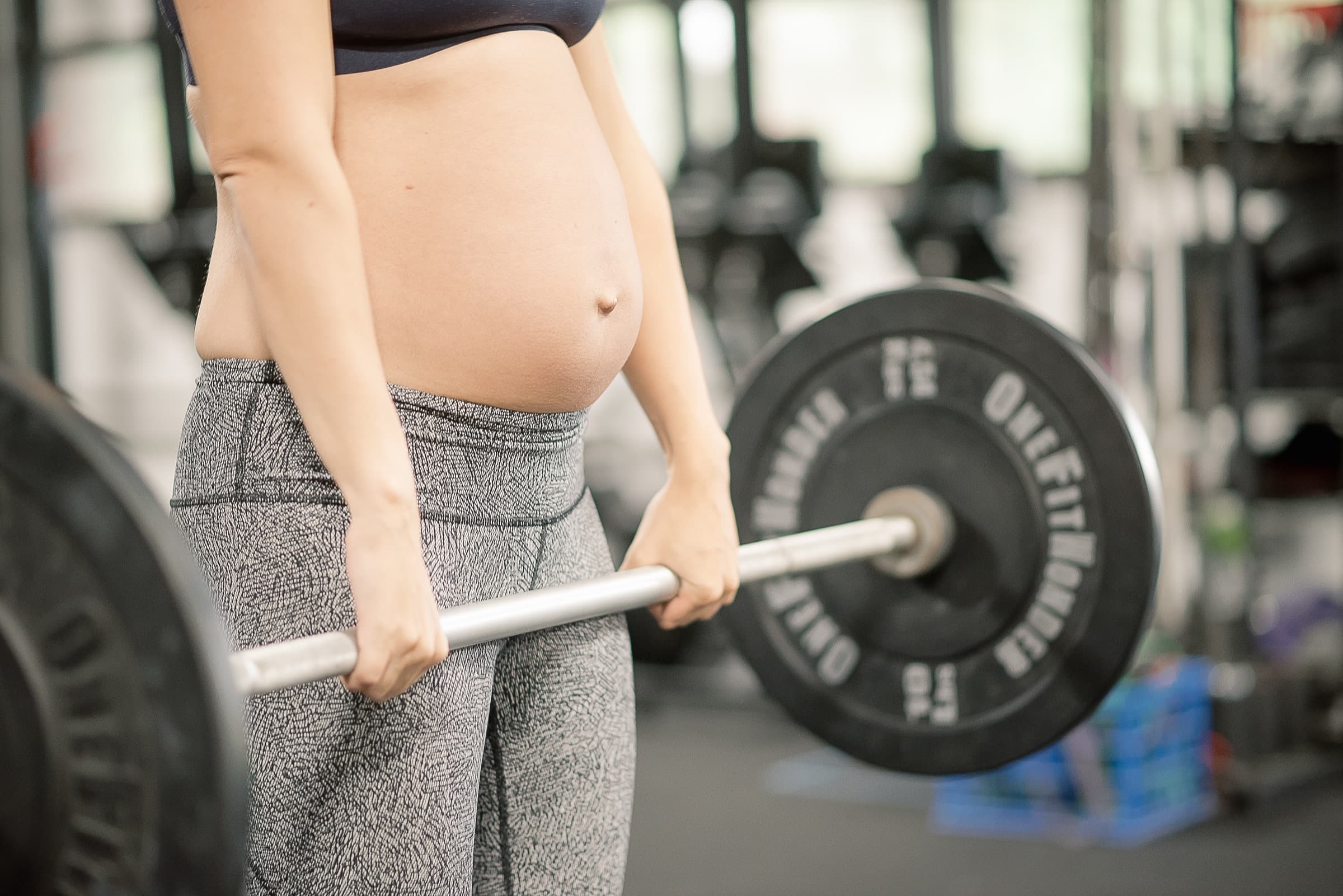 Pregnant woman receiving physical therapy care