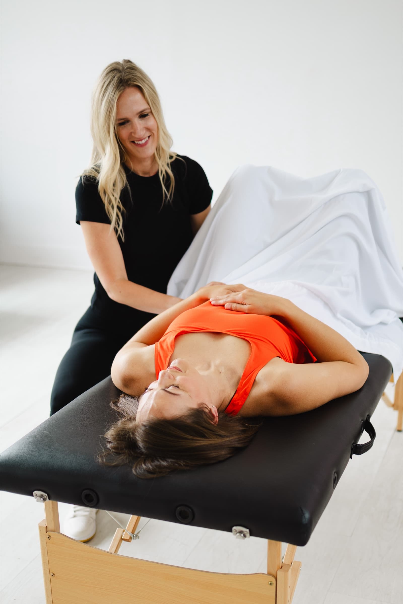 Woman receiving pelvic floor physical therapy consultation